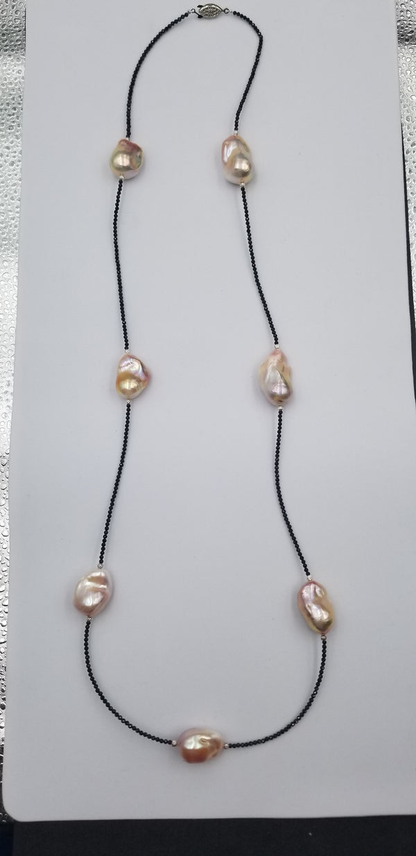 38"PINK FRESHWATER BAROQUE SHAPE PEARL W/ BLACK SPINAL NECKLACE AND STERLING SILVER BEADS AND CLASP