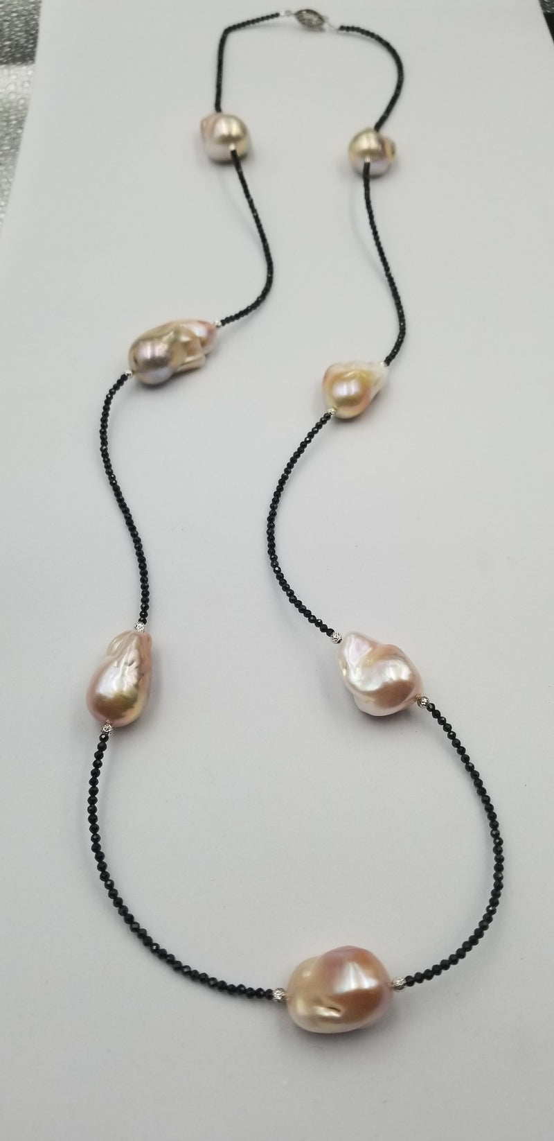 38"PINK FRESHWATER BAROQUE SHAPE PEARL W/ BLACK SPINAL NECKLACE AND STERLING SILVER BEADS AND CLASP