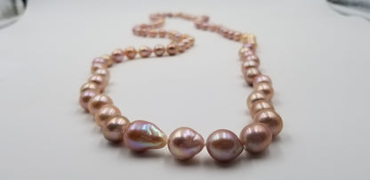 10-14 MM BAROQUE /TEAR DROP GRADUATE 46 " LONG FRESHWATER CULTURE ALL PINK NECKLACE