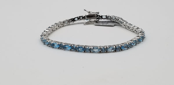 BLUE TOPAZ OVAL 3X5 MM STERLING SILVER TENNIS BRACELET