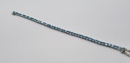 BLUE TOPAZ OVAL 3X5 MM STERLING SILVER TENNIS BRACELET