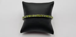 PERIDOT ROUND/EMERALD CUT STERLING SILVER BRACELET