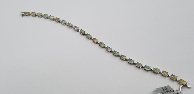 OPAL 4X6 MM CABOCHON CUT STERLING SILVER BRACELET