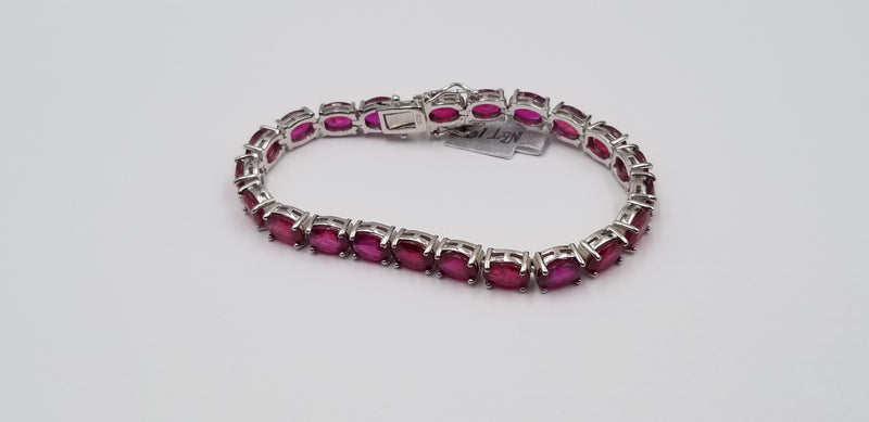 RUBY 6X8 MM OVAL SHAPE STERLING SILVER TENNIS BRACELET