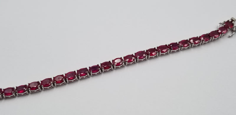 RUBY 6X8 MM OVAL SHAPE STERLING SILVER TENNIS BRACELET