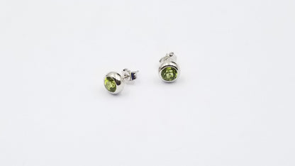 PERIDOT 6 MM ROUND BEZEL SET STERLING SILVER STUD EARRINGS