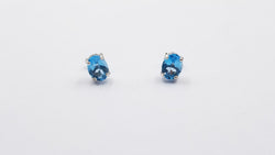 BLUE TOPAZ 6X8MM OVAL PRONG SET STERLING SILVER STUDS EARRINGS