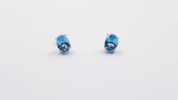 BLUE TOPAZ 6X8MM OVAL PRONG SET STERLING SILVER STUDS EARRINGS