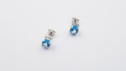 BLUE TOPAZ 6X8MM OVAL PRONG SET STERLING SILVER STUDS EARRINGS