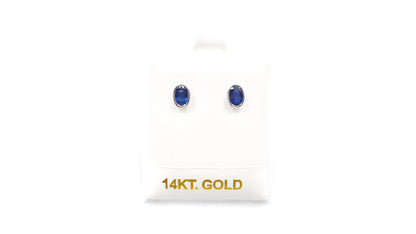 SAPPHIRES 5X7MM OVAL BEZEL SET 14 KT WHITE GOLD STUDS EARRINGS
