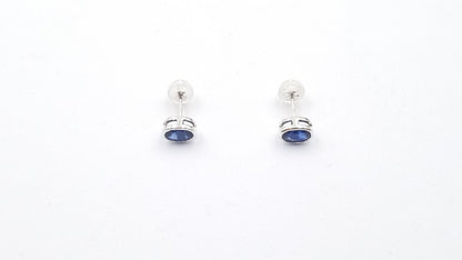 SAPPHIRES 5X7MM OVAL BEZEL SET 14 KT WHITE GOLD STUDS EARRINGS