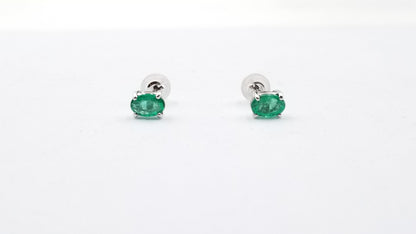EMERALD 4X6 MM OVAL PRONG SET 14 KT WHITE GOLD STUDS EARRINGS