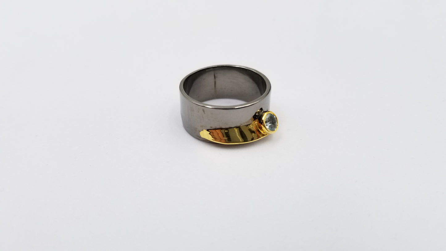 BLUE TOPAZ BEZEL SET TWO TONE BLACK RHODIUM FINISHED STERLING SILVER RING