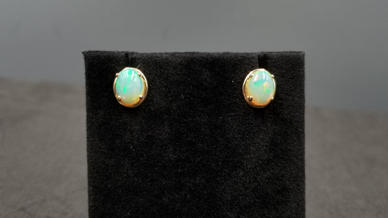 OPAL ( ETHIOPIAN ) 7X9 CABOCHON 14 KT YELLOW GOLD STUDS EARRING