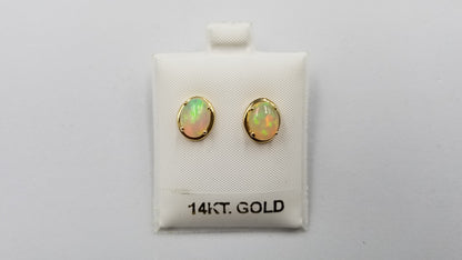 OPAL ( ETHIOPIAN ) 7X9 CABOCHON 14 KT YELLOW GOLD STUDS EARRING