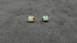 OPAL ( ETHIOPIAN ) 4X6 CABOCHON 14 KT YELLOW GOLD STUDS EARRING