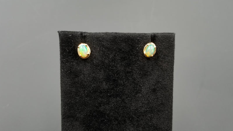 OPAL ( ETHIOPIAN ) 4X6 CABOCHON 14 KT YELLOW GOLD STUDS EARRING