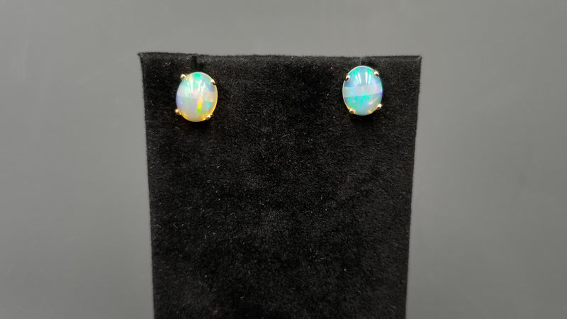 OPAL ( ETHIOPIAN ) 8X10 CABOCHON 14 KT YELLOW GOLD STUDS EARRING