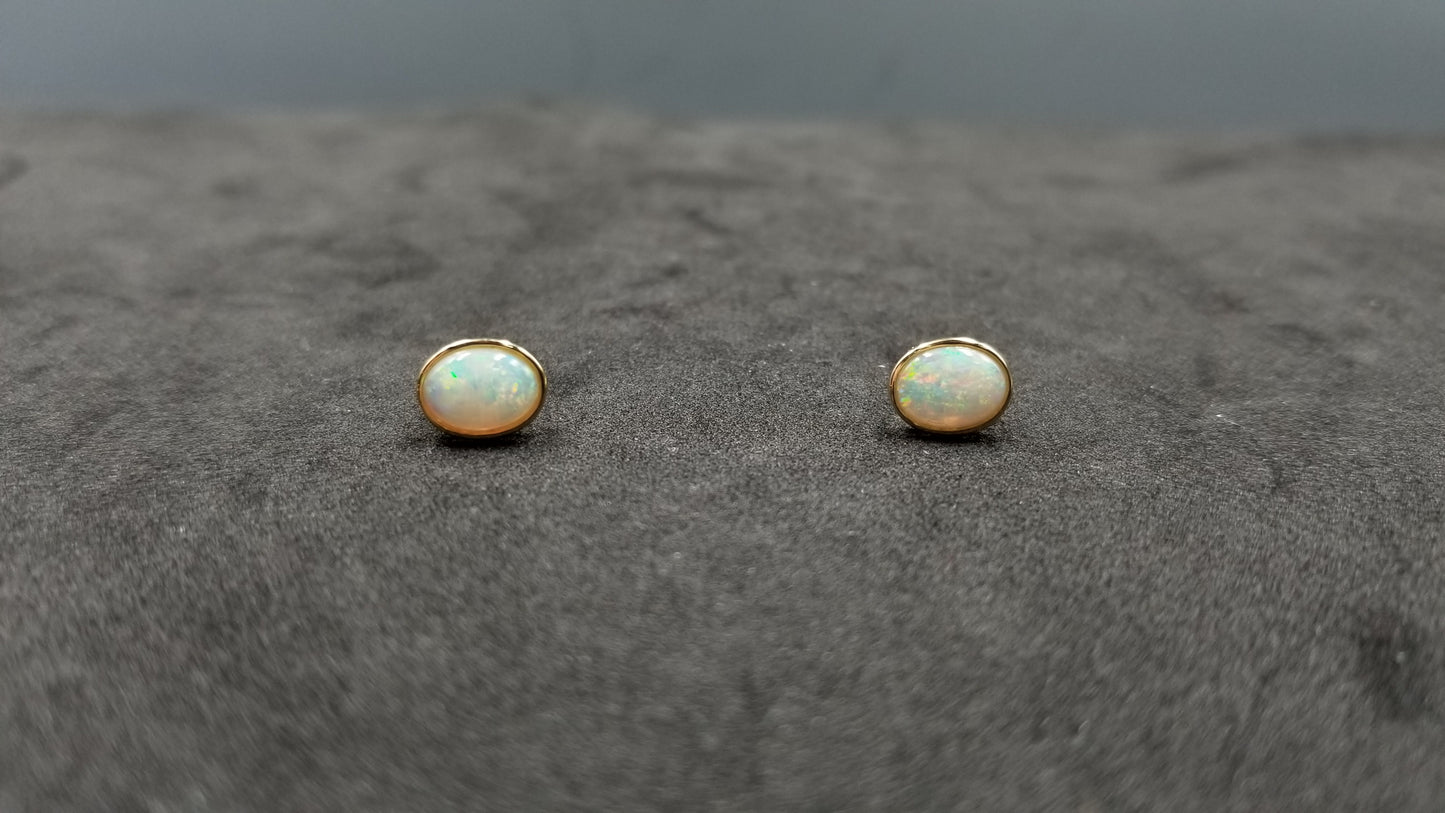 OPAL ( AUSTRALIAN ) 6X8 MM 14 KT YELLOW GOLD BEZEL SET PUSH BACKS EARRINGS