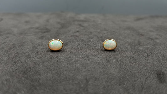 OPAL ( AUSTRALIAN ) 6X8 MM 14 KT YELLOW GOLD BEZEL SET PUSH BACKS EARRINGS