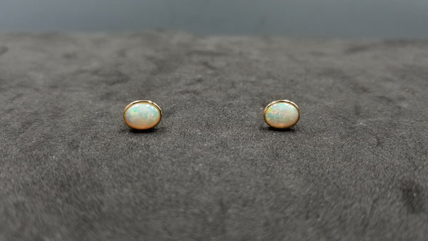 OPAL ( AUSTRALIAN ) 6X8 MM 14 KT YELLOW GOLD BEZEL SET PUSH BACKS EARRINGS