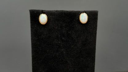 OPAL ( AUSTRALIAN ) 6X8 MM 14 KT YELLOW GOLD BEZEL SET PUSH BACKS EARRINGS