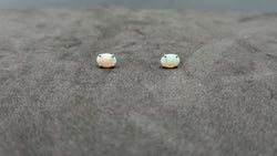 OPAL ( AUSTRALIAN ) 5X7 MM 14 KT YELLOW GOLD STUDS EARRINGS