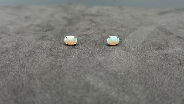 OPAL ( AUSTRALIAN ) 5X7 MM 14 KT YELLOW GOLD STUDS EARRINGS