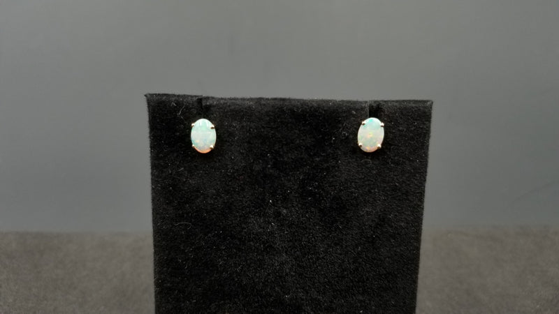 OPAL ( AUSTRALIAN ) 5X7 MM 14 KT YELLOW GOLD STUDS EARRINGS