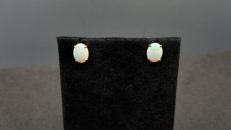 OPAL ( AUSTRALIAN ) 7X9 MM OVAL CABOCHON 14 KT YELLOW GOLD STUDS EARRINGS