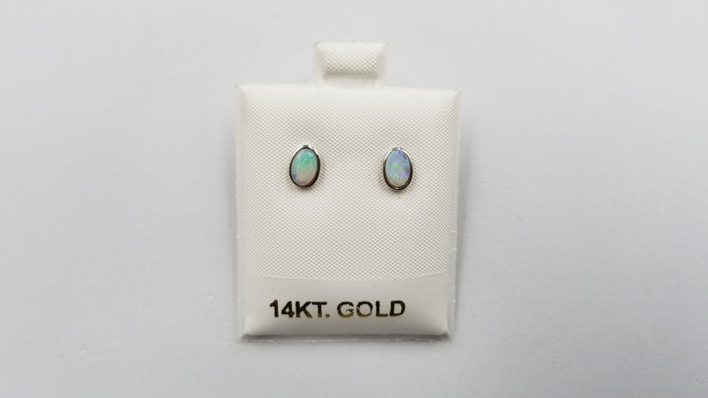 OPAL ( AUSTRALIAN )5X7 MM OVAL BEZEL SET 14 KT WHITE GOLD STUDS EARRINGS