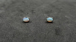 OPAL ( AUSTRALIAN )5X7 MM OVAL BEZEL SET 14 KT WHITE GOLD STUDS EARRINGS