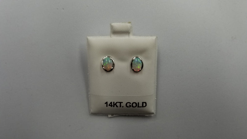 OPAL ( AUSTRALIAN )5X7 MM OVAL 14 KT WHITE GOLD STUDS EARRINGS