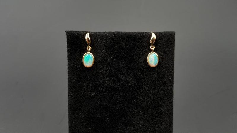 OPAL ( AUSTRALIAN ) 6X8 OVAL BEZEL SET 14 KT YELLOW GOLD DANGLE EARRINGS