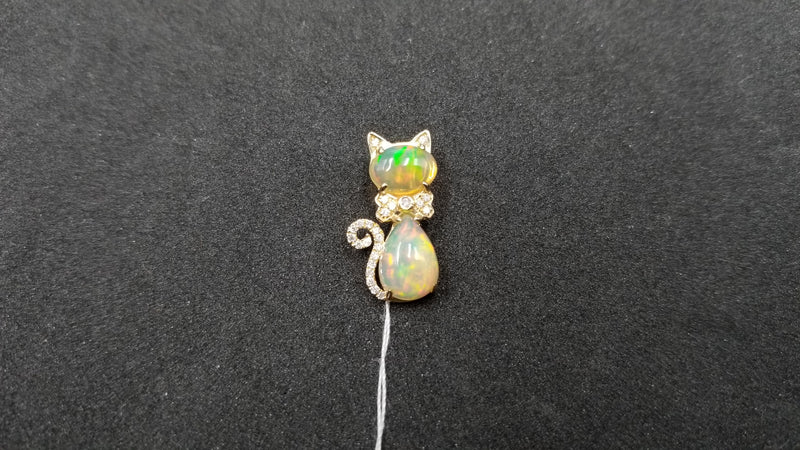 OPAL ( ETHIOPIAN ) WITH DIAMONDS FANCY CAT 14 KT YELLOW GOLD PENDANT