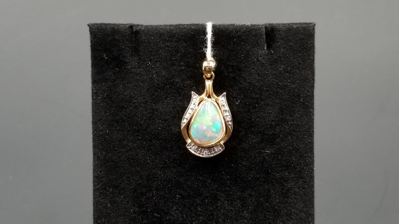 OPAL ( AUSTRALIAN ) FREEFORM WITH DIAMONDS 14 KT YELLOW GOLD BEZEL SET PENDANT