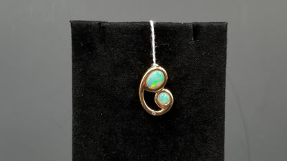 OPAL ( AUSTRALIAN ) WITH DIAMOND BEZEL SET 14 KT YELLOW GOLD MOTHER AND SON PENDANT