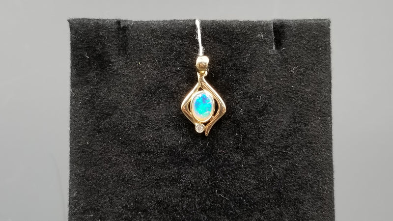 OPAL ( AUSTRALIAN ) OVAL BEZEL SET WITH DIAMOND 14 KT YELLOW GOLD PENDANT