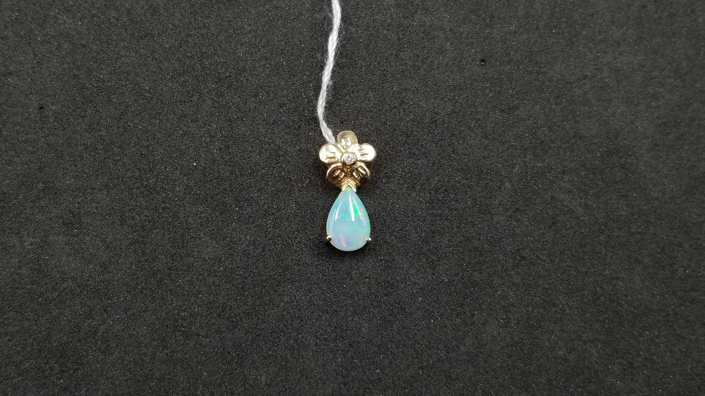 OPAL ( AUSTRALIAN ) PEAR SHAPE WITH DIAMOND 14 KT YELLOW GOLD PENDANT