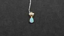 OPAL ( AUSTRALIAN ) PEAR SHAPE WITH DIAMOND 14 KT YELLOW GOLD PENDANT