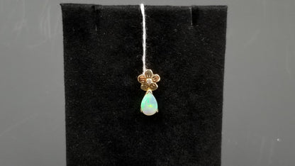 OPAL ( AUSTRALIAN ) PEAR SHAPE WITH DIAMOND 14 KT YELLOW GOLD PENDANT
