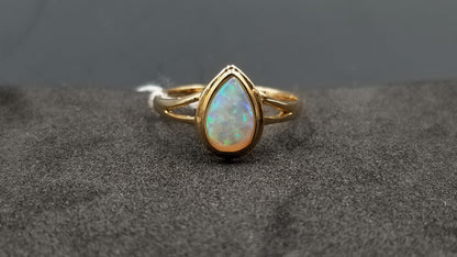 OPAL ( AUSTRALIAN ) PEAR SHAPE BEZEL SET 14 KT YELLOW GOLD RING