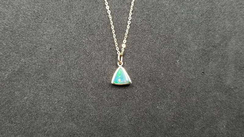 BOULDER OPAL DOUBLET TRIANGLE 7 MM BEZEL SET 14 KT YELOW GOLD PENDANT WITH 16" CHAIN