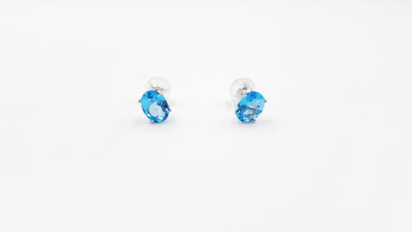 BLUE TOPAZ 6X8 MM OVAL SHAPE 14 KT WHITE GOLD PRONG SET STUDS EARRINGS