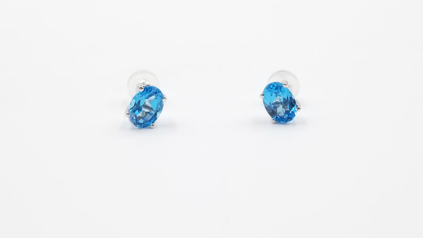 BLUE TOPAZ 5X7 MM OVAL SHAPE 14 KT WHITE GOLD PRONG SET STUDS EARRINGS