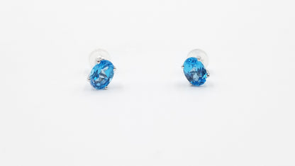 BLUE TOPAZ 5X7 MM OVAL SHAPE 14 KT WHITE GOLD PRONG SET STUDS EARRINGS