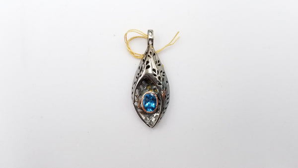 BLUE TOPAZ TWO TONE ( GOLD PLATED , BLACK RHODIUM ) STERLING SILVER PENDANT