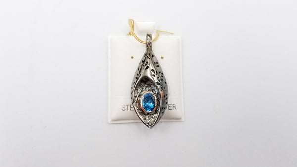 BLUE TOPAZ TWO TONE ( GOLD PLATED , BLACK RHODIUM ) STERLING SILVER PENDANT
