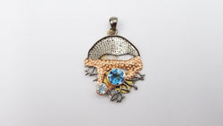 BLUE TOPAZ TWO TONE ( BLACK RHODIUM AND GOLD PLATED ) STERLING SILVER PENDANT