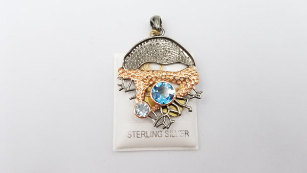 BLUE TOPAZ TWO TONE ( BLACK RHODIUM AND GOLD PLATED ) STERLING SILVER PENDANT
